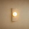 Applique murale globe en travertin naturel, une sphère de verre opalin, modèle Barre 1 Globe