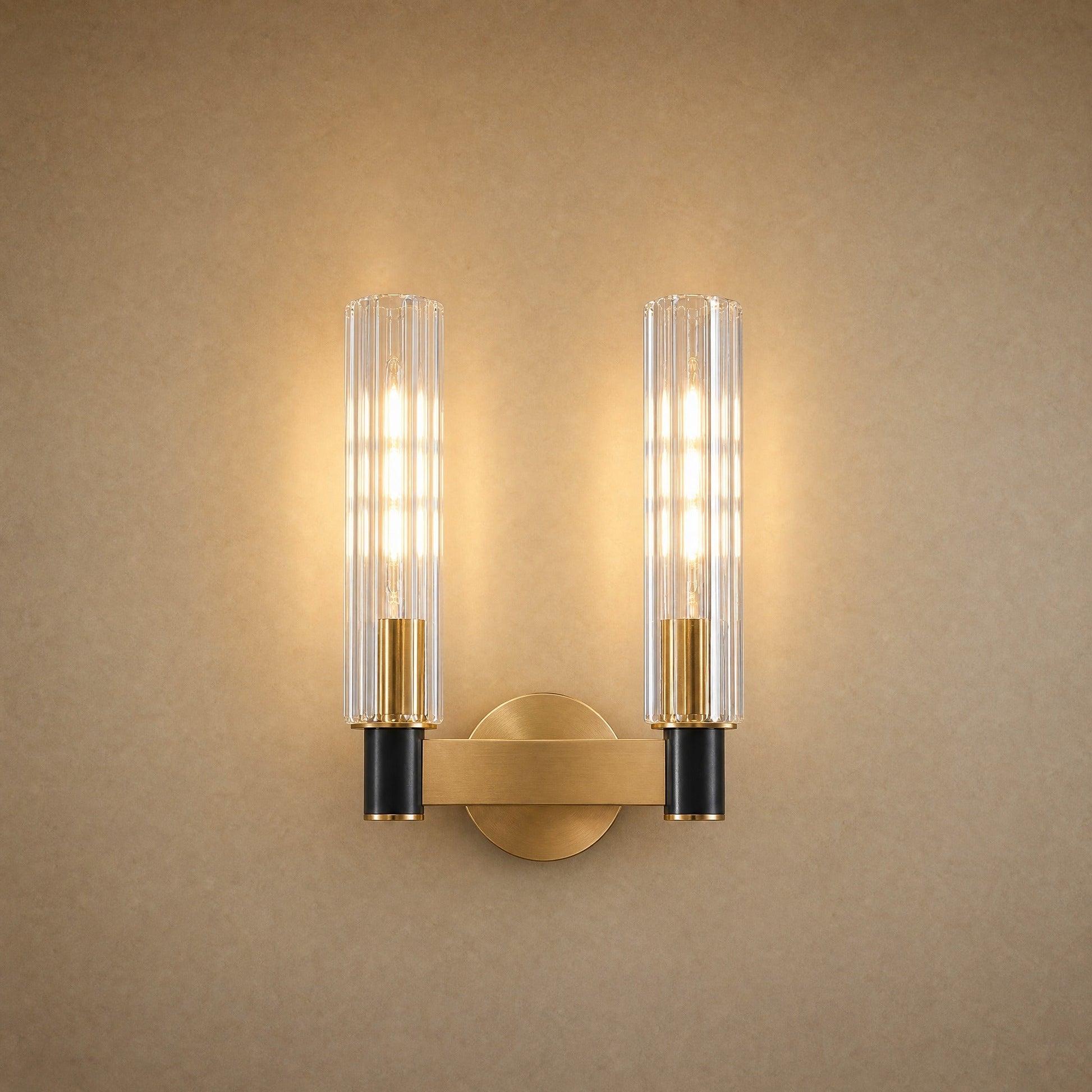 Applique murale cristal 2 lumières, deux fûts cannelés sur barre de laiton | Delvanie