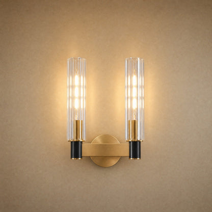 Applique murale cristal 2 lumières, deux fûts cannelés sur barre de laiton | Delvanie